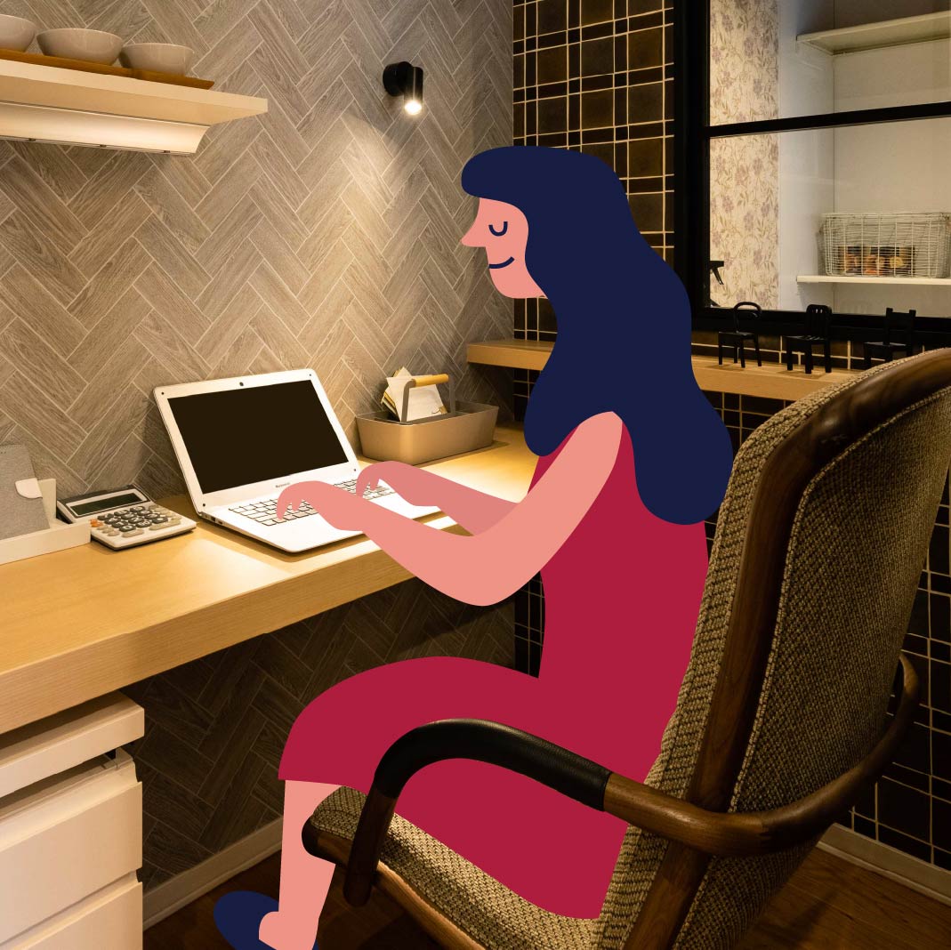 パソコンを操作する女性の画像