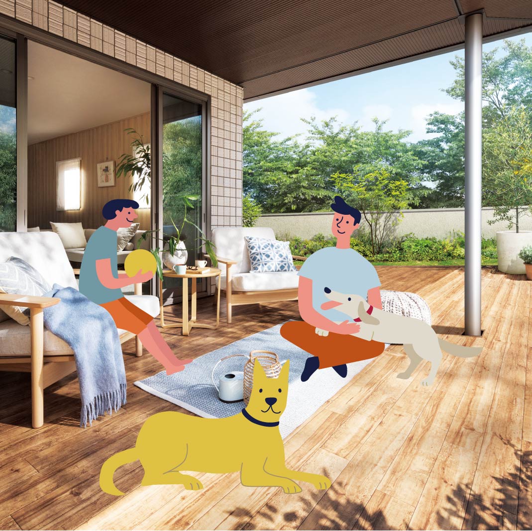 庭で犬と遊ぶ親子の画像