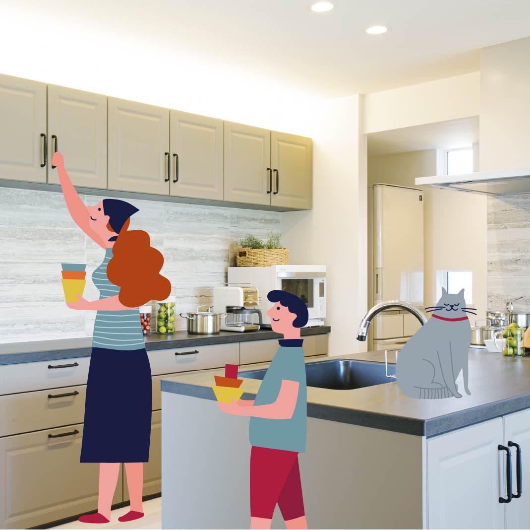 キッチンで食器の片づけをする親子の画像