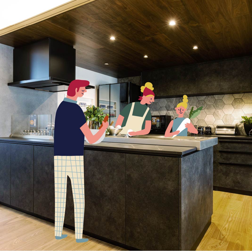 家族3人で料理をする画像